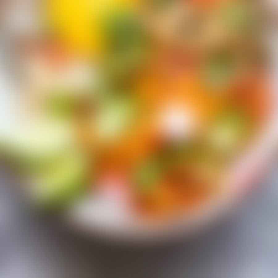 Fresh salad bowl filled with colorful pickled vegetables
